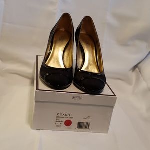 Coach wedge pumps